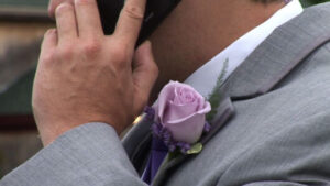 closeup on rose from wedding video still